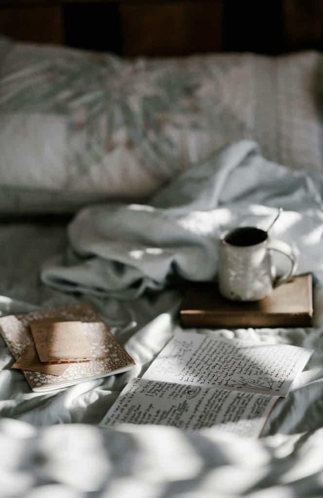 A calm morning scene with a journal and coffee